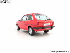 A Luxurious Mk1 Ford Fiesta 1300 Ghia , Sunburst Red, £ 10,995