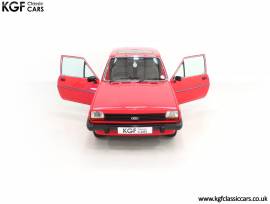 A Luxurious Mk1 Ford Fiesta 1300 Ghia , Sunburst Red, £ 10,995