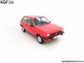 A Luxurious Mk1 Ford Fiesta 1300 Ghia , Sunburst Red, £ 10,995