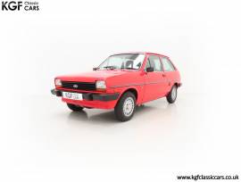 A Luxurious Mk1 Ford Fiesta 1300 Ghia , Sunburst Red, £ 10,995